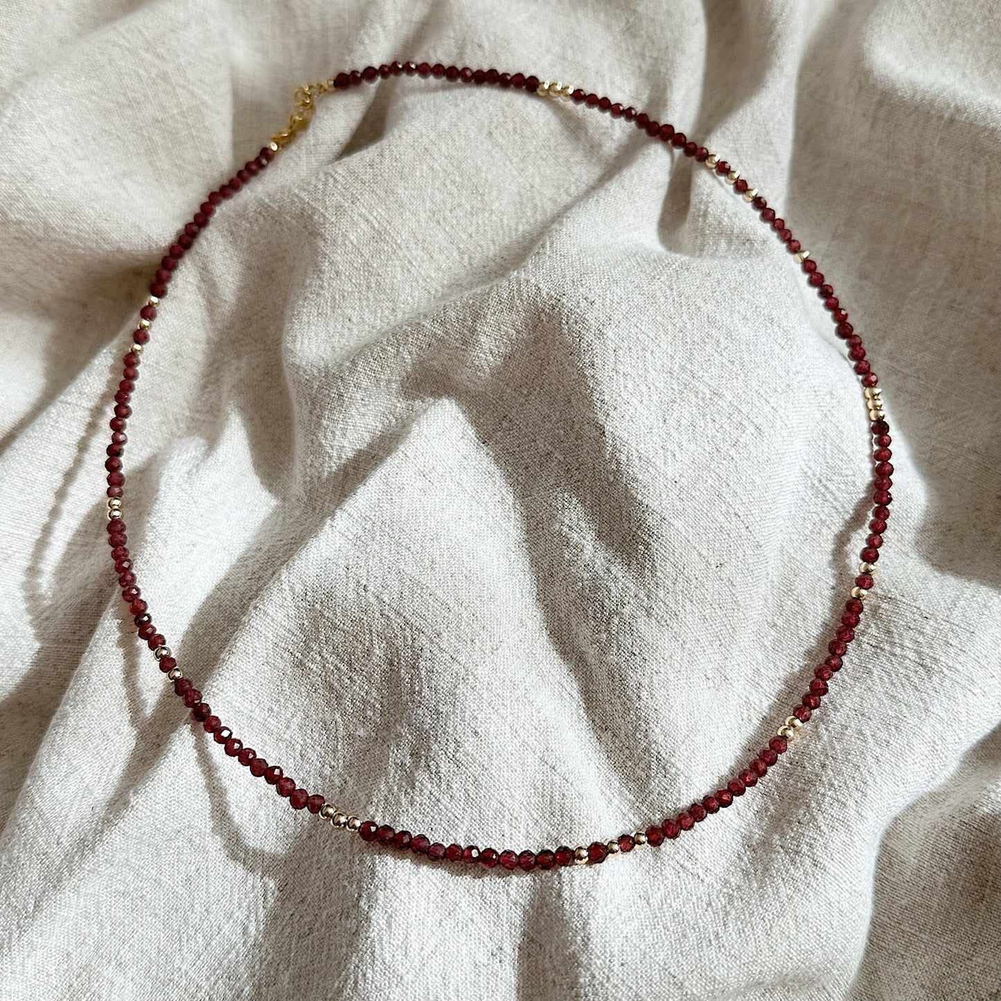 Bead Garnet Necklace with Triple Gold Beads