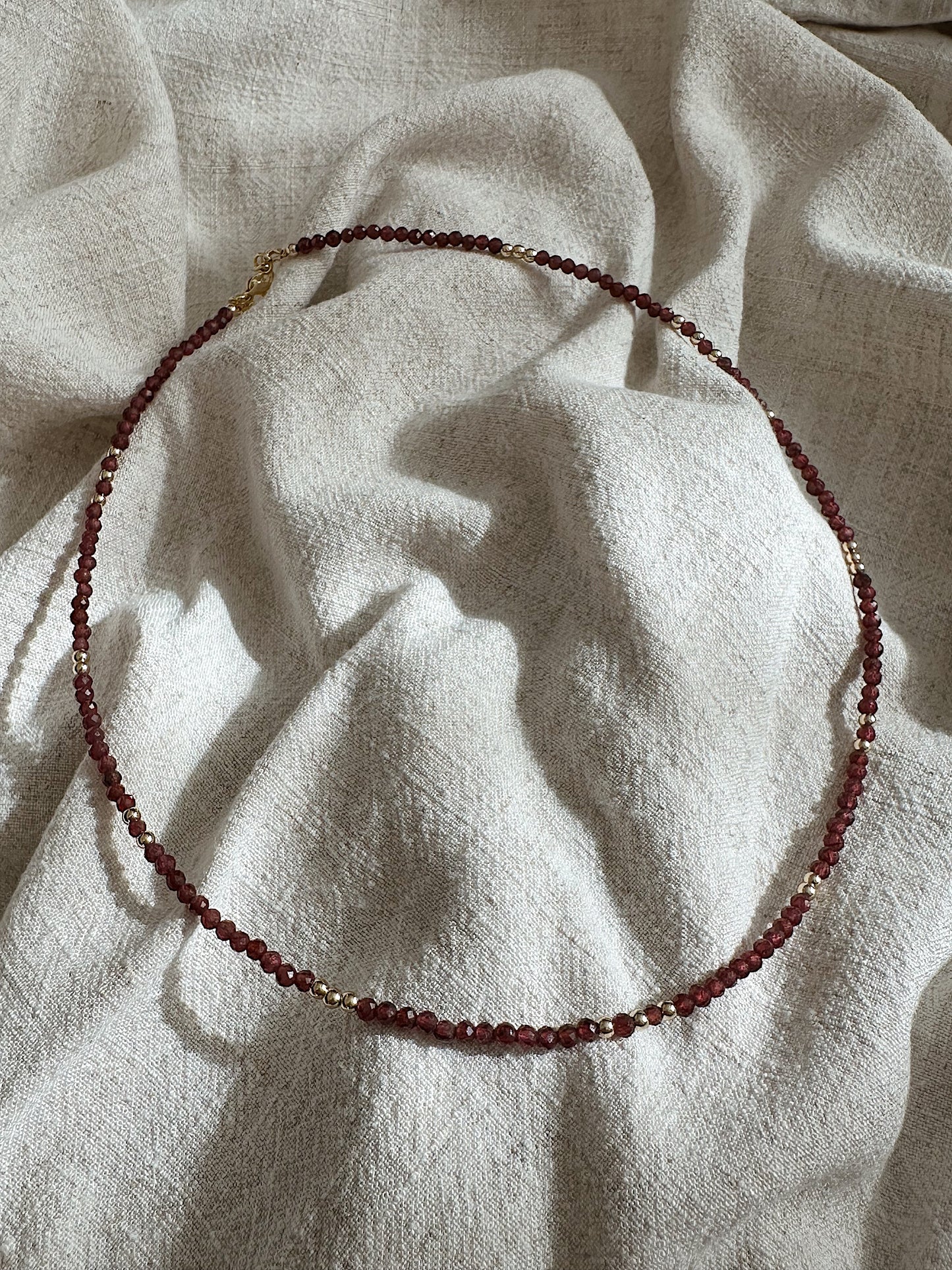 Bead Garnet Necklace with Triple Gold Beads